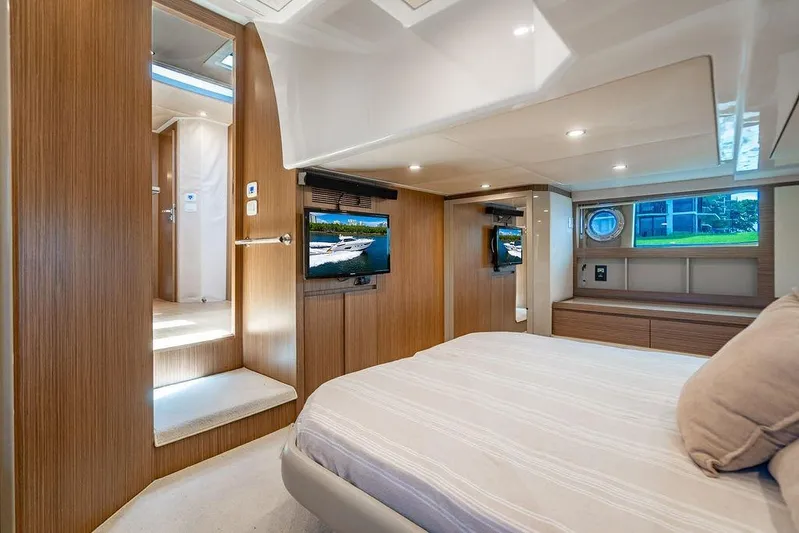 Endurance Yacht Photos Pics Luxurious interior of 2016 Azimut Atlantis 50 yacht bedroom with modern amenities.