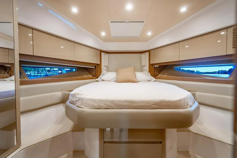 Endurance Yacht Photos Pics Luxurious interior of 2016 Azimut Atlantis 50 yacht with elegant bed and ambient lighting.