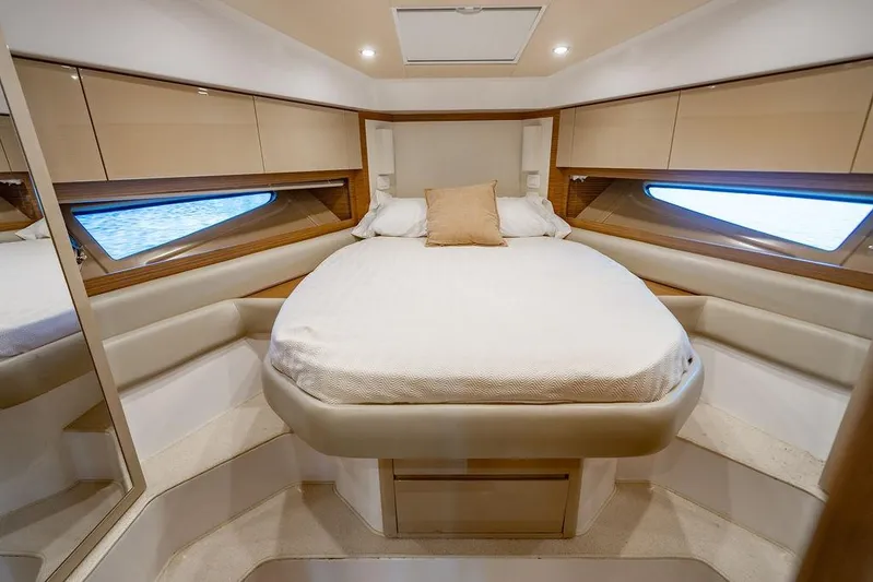 Endurance Yacht Photos Pics Luxurious bedroom interior of 2016 Azimut Atlantis 50 yacht with elegant design.