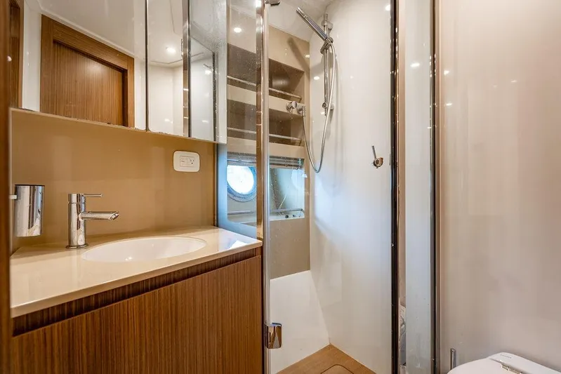 Endurance Yacht Photos Pics Luxurious bathroom in 2016 Azimut Atlantis 50 yacht with modern fixtures and shower.