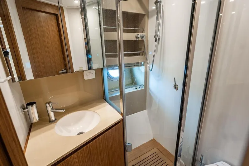 Endurance Yacht Photos Pics Luxurious bathroom in 2016 Azimut Atlantis 50 yacht with modern fixtures and shower.