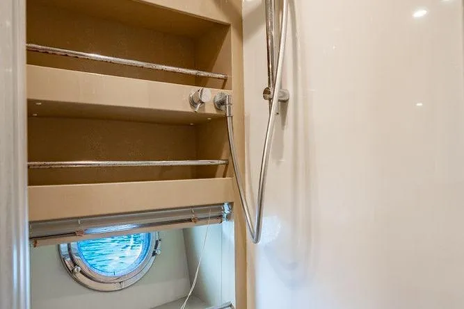 Endurance Yacht Photos Pics Interior of 2016 Azimut Atlantis 50 yacht bathroom with shower and porthole.