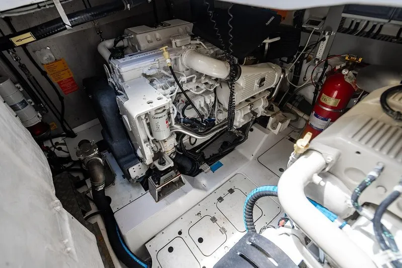 Endurance Yacht Photos Pics Engine room of 2016 Azimut Atlantis 50 yacht, featuring mechanical components and fire extinguisher.