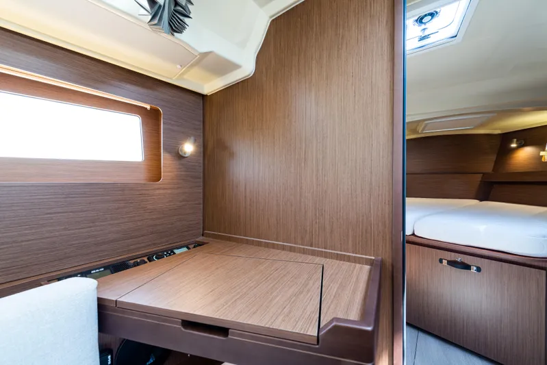  Yacht Photos Pics Interior of 2020 Beneteau Oceanis 41.1 yacht with wooden finish and cozy cabin.
