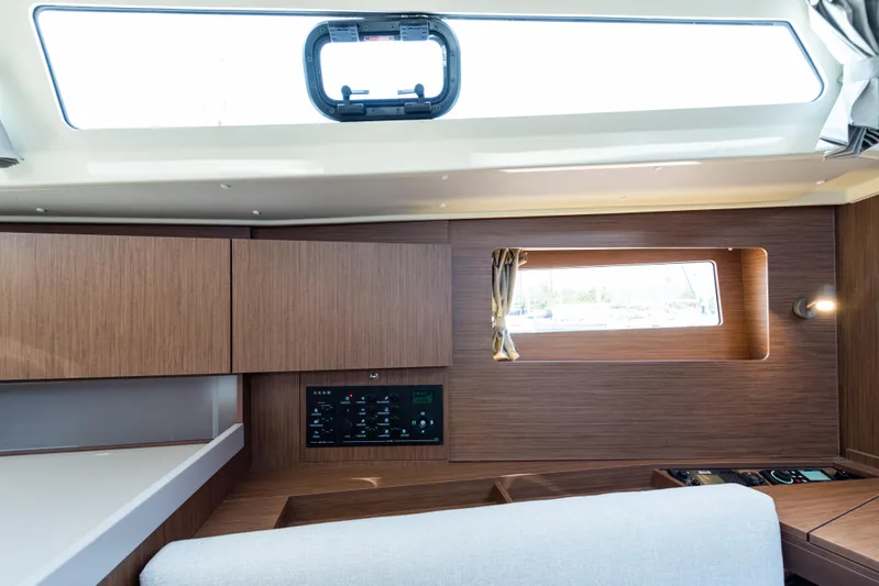  Yacht Photos Pics Interior of 2020 Beneteau Oceanis 41.1 yacht, featuring modern wood cabinetry and natural light.