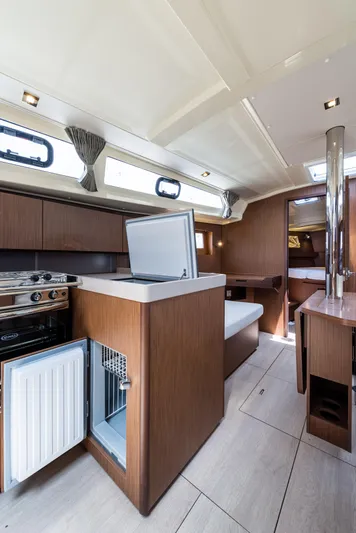  Yacht Photos Pics Interior of 2020 Beneteau Oceanis 41.1 yacht, featuring modern kitchen and seating area.