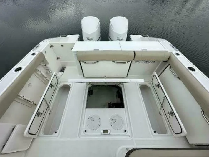  Yacht Photos Pics 2019 Pursuit DC 325 Dual Console boat with spacious deck and twin engines.