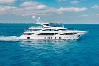 Luxurious 2016 Benetti Custom Built yacht cruising on clear blue ocean waters.