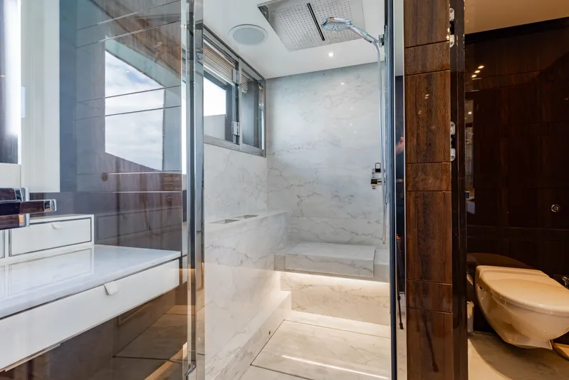 Domani Yacht Photos Pics Luxurious marble bathroom in 2016 Benetti Custom Built yacht.