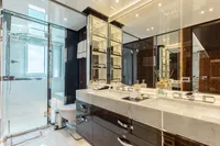 Luxurious bathroom in 2016 Benetti Custom Built yacht with modern fixtures and elegant design.