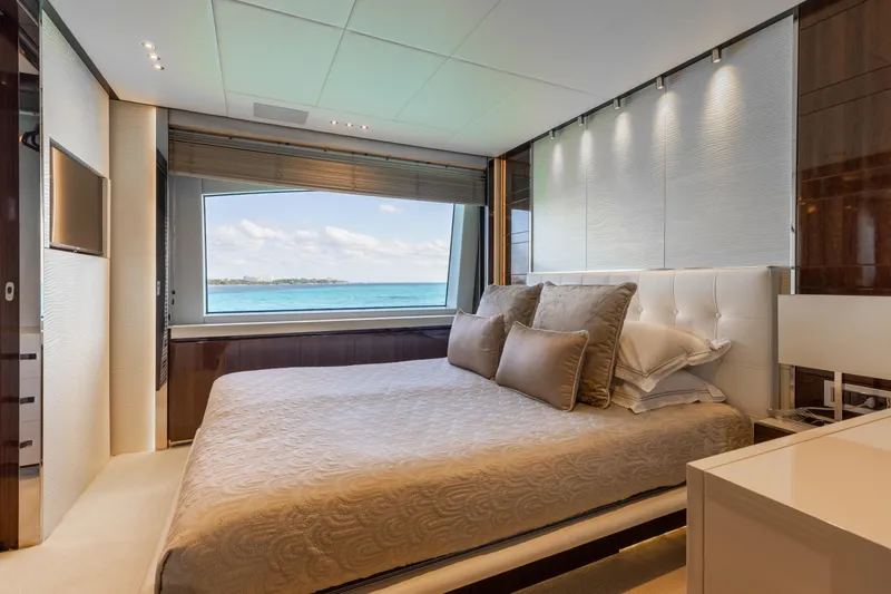 Domani Yacht Photos Pics Luxurious bedroom on 2016 Benetti Custom Built yacht with ocean view.