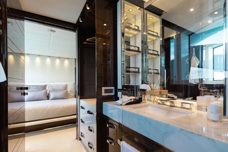 Domani Yacht Photos Pics Luxurious Benetti Custom Built 2016 yacht interior with elegant bedroom and modern bathroom design.