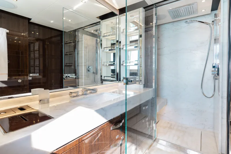 Domani Yacht Photos Pics Luxurious bathroom in 2016 Benetti Custom Built yacht with modern fixtures and glass shower.