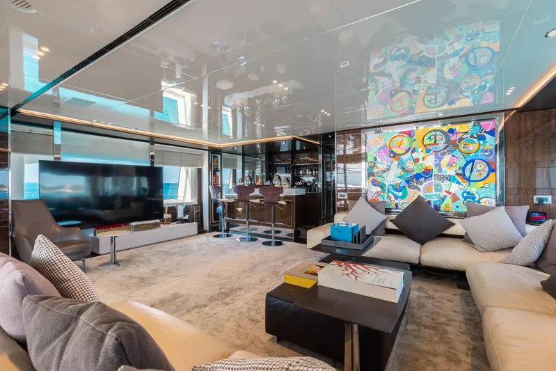 Domani Yacht Photos Pics Luxurious Benetti Custom Built 2016 yacht interior with modern decor and vibrant artwork.