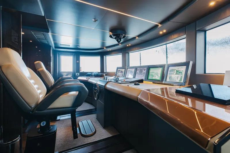 Domani Yacht Photos Pics Luxurious Benetti Custom Built yacht interior, 2016 model, featuring advanced navigation systems and plush seating.