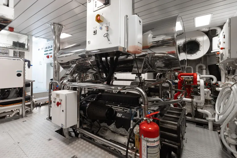 Domani Yacht Photos Pics Engine room of 2016 Benetti Custom Built yacht, featuring advanced machinery and equipment.