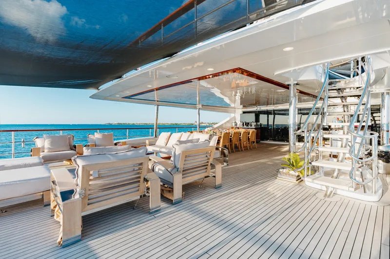 Domani Yacht Photos Pics Luxurious Benetti Custom Built 2016 yacht deck with elegant seating and ocean view.