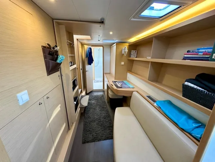 Never Say Never Yacht Photos Pics Interior of 2017 Lagoon 42 catamaran with modern furnishings and ample storage space.