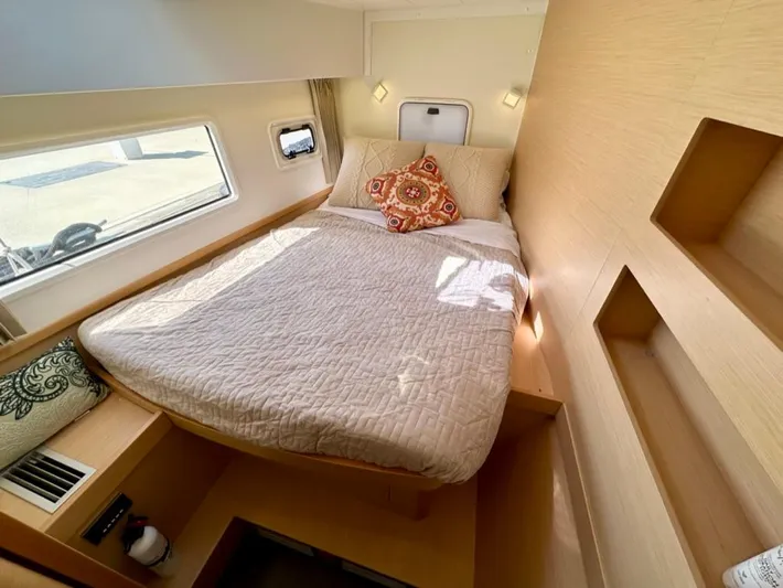 Never Say Never Yacht Photos Pics Cozy bedroom in 2017 Lagoon 42 yacht with natural light and modern design.