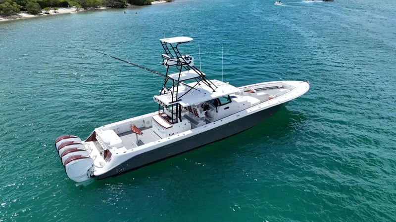  Yacht Photos Pics 2019 HCB 53 Sueños boat on clear blue water, aerial view.