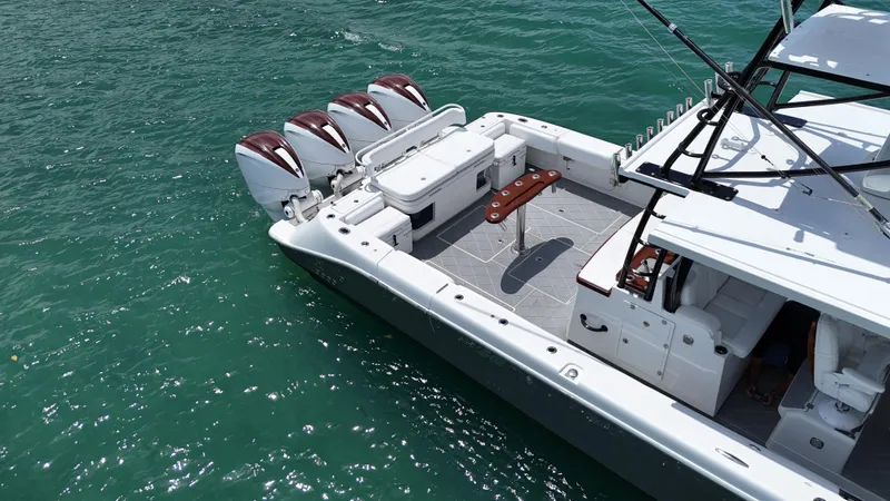  Yacht Photos Pics 2019 HCB 53 Sueños boat with four engines on turquoise water.