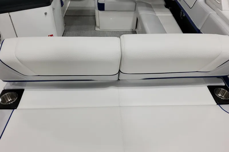  Yacht Photos Pics 2026 Formula 310 Bowrider I/O interior with white seating and cup holders.