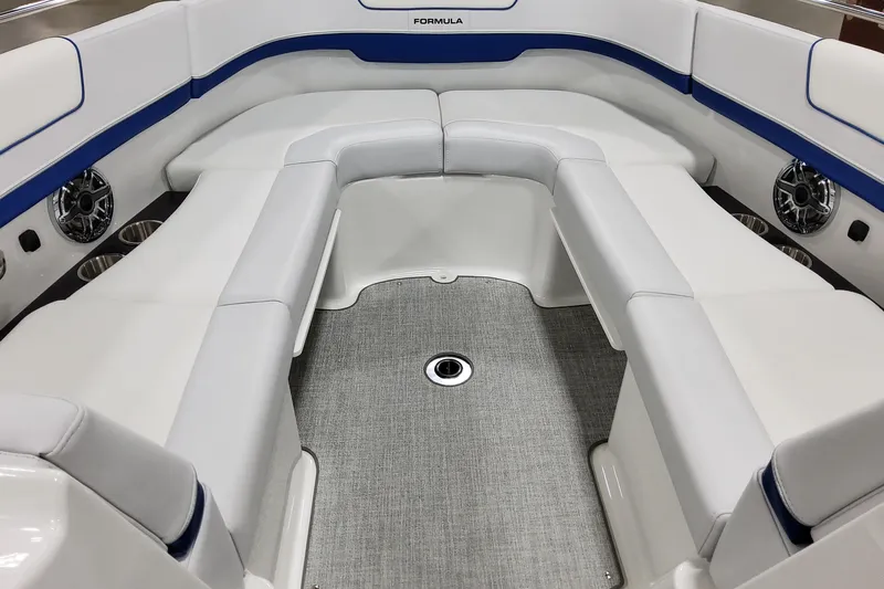  Yacht Photos Pics 2026 Formula 310 Bowrider I/O interior with white seating and blue accents.
