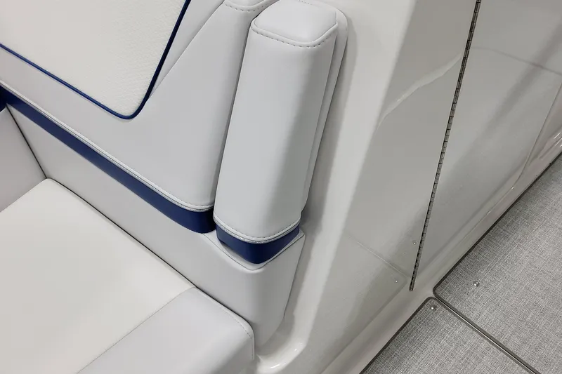  Yacht Photos Pics 2026 Formula 310 Bowrider I/O interior seating detail with white and blue upholstery.