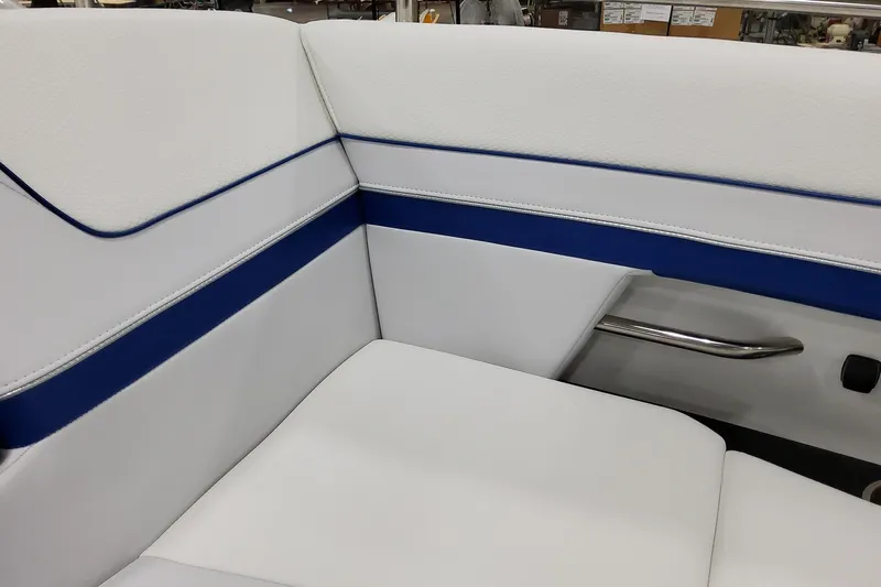  Yacht Photos Pics 2026 Formula 310 Bowrider I/O interior with white and blue seating detail.
