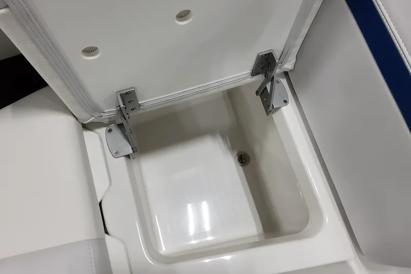  Yacht Photos Pics 2026 Formula 310 Bowrider I/O storage compartment with open lid and metal hinges.