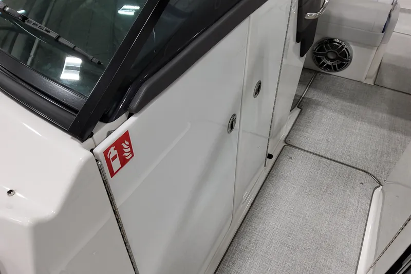  Yacht Photos Pics 2026 Formula 310 Bowrider I/O interior with fire extinguisher sign and speaker.