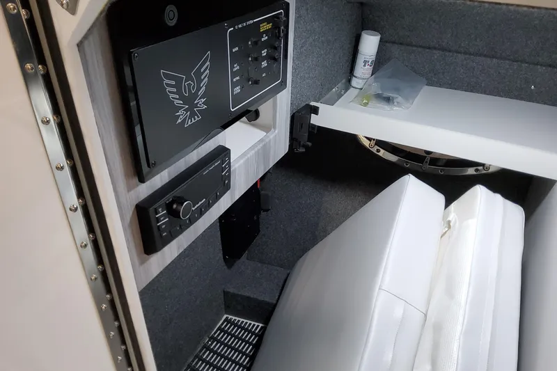  Yacht Photos Pics Interior of 2026 Formula 310 Bowrider I/O boat with control panel and seating.