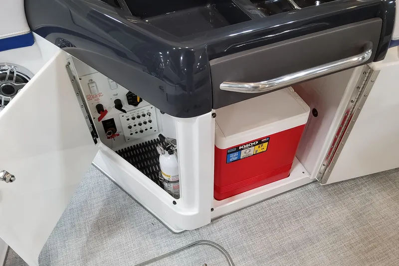  Yacht Photos Pics 2026 Formula 310 Bowrider I/O interior with storage, cooler, and fire extinguisher.