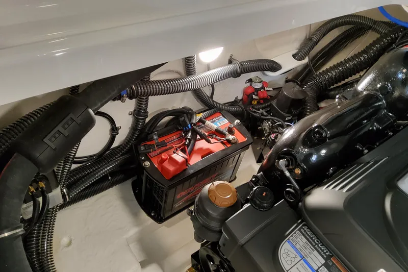  Yacht Photos Pics Engine compartment of 2026 Formula 310 Bowrider I/O with battery and wiring.