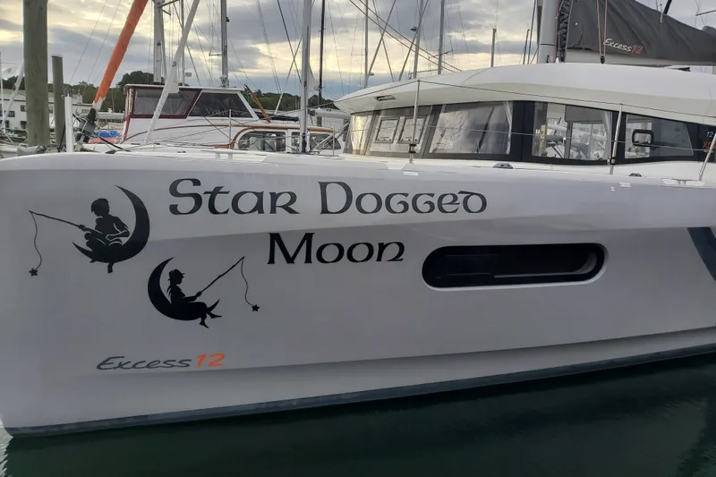  Yacht Photos Pics Catamaran "Star Dogged Moon" docked, featuring "Excess 12" branding, 2020 model.