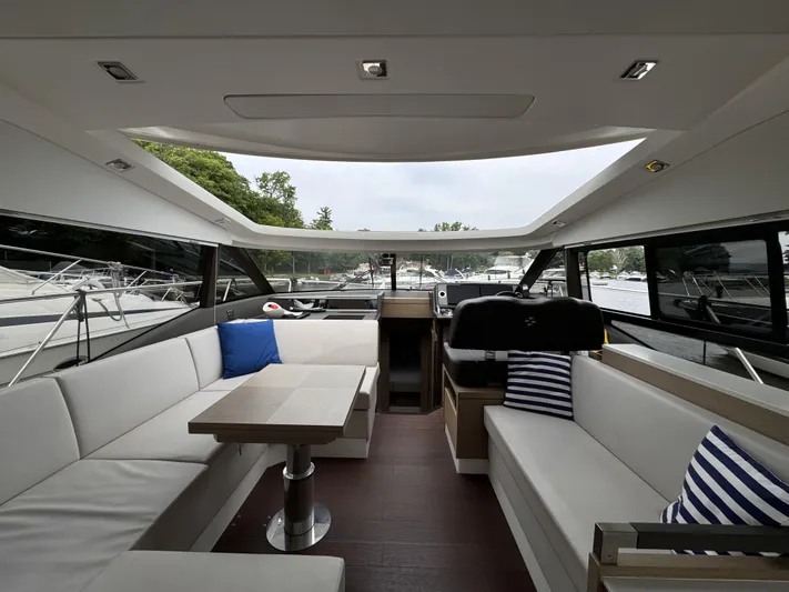  Yacht Photos Pics Luxurious interior of 2020 Prestige 460S yacht with spacious seating and modern design.