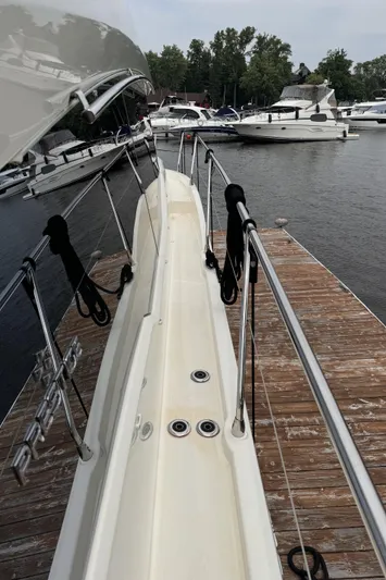  Yacht Photos Pics 2020 Prestige 460S yacht docked at marina, showcasing sleek design and modern features.