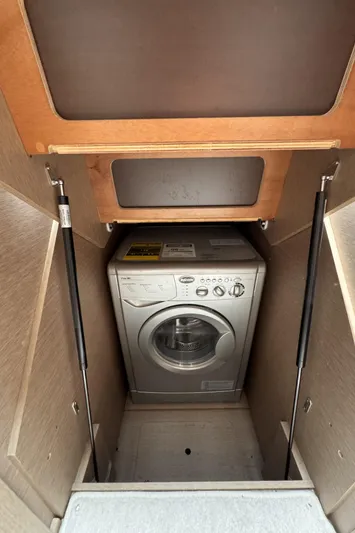  Yacht Photos Pics Washing machine in 2020 Prestige 460S yacht interior compartment.