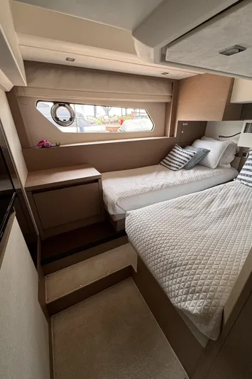  Yacht Photos Pics Interior of 2020 Prestige 460S yacht with twin beds and modern decor.