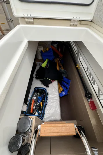  Yacht Photos Pics Storage compartment on a 2020 Prestige 460S yacht with tools and gear.