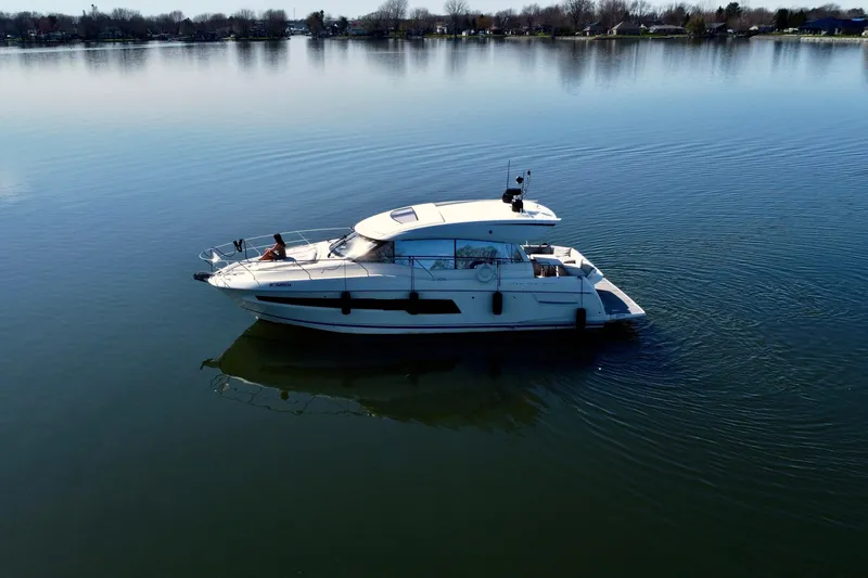  Yacht Photos Pics 2020 Prestige 460S yacht cruising on a calm lake.
