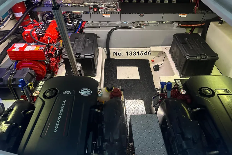 It's About Time Yacht Photos Pics Engine room of 2022 Regal 38 Grande Coupe with Volvo Penta engines and equipment.