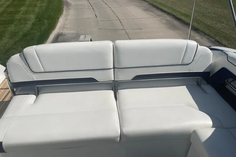  Yacht Photos Pics 2016 Formula 330 Crossover Bowrider, white leather seating, outdoor setting.