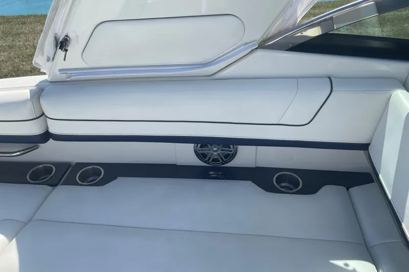  Yacht Photos Pics 2016 Formula 330 Crossover Bowrider interior with white seating and cup holders.