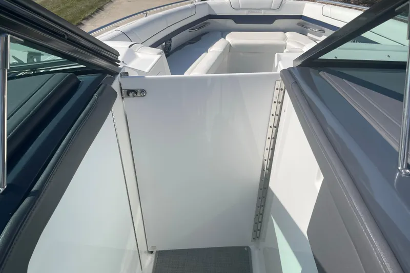  Yacht Photos Pics 2016 Formula 330 Crossover Bowrider interior with open door and seating area.