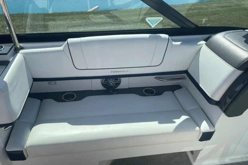  Yacht Photos Pics 2016 Formula 330 Crossover Bowrider interior with white seating and speaker system.