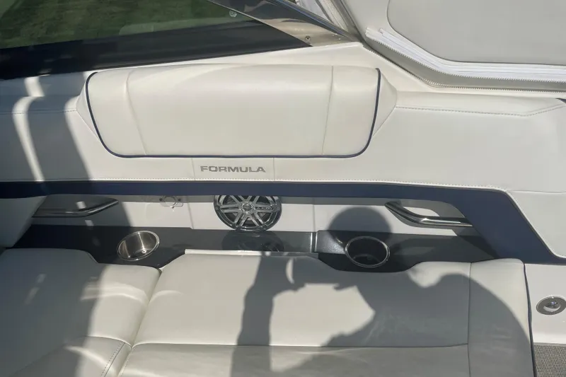  Yacht Photos Pics 2016 Formula 330 Crossover Bowrider interior with white leather seating and speaker system.