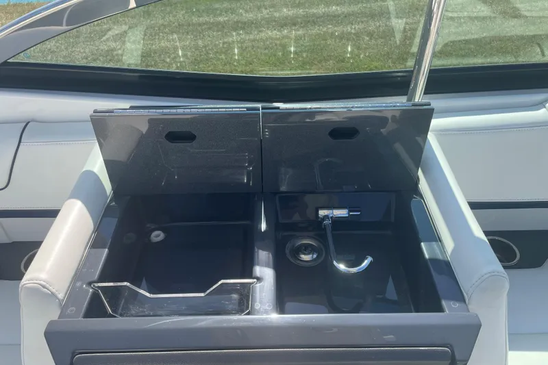  Yacht Photos Pics 2016 Formula 330 Crossover Bowrider sink and storage area with sleek design.