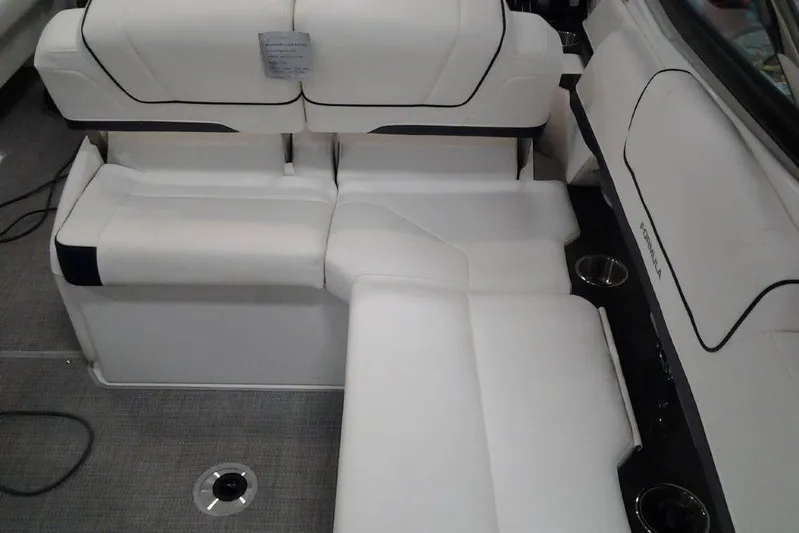  Yacht Photos Pics 2016 Formula 330 Crossover Bowrider interior with white seating and cup holders.