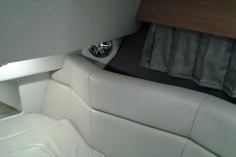  Yacht Photos Pics 2016 Formula 330 Crossover Bowrider interior with white leather seating and speaker.